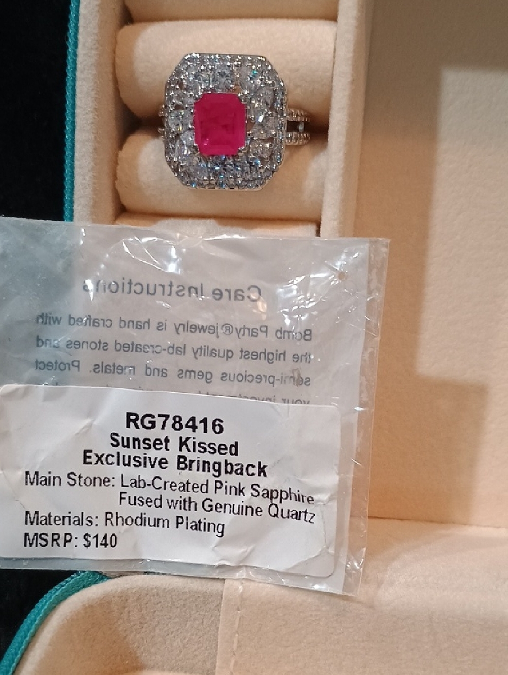 Exclusive Bringback Pink Sapphire Ring with Halo Accent